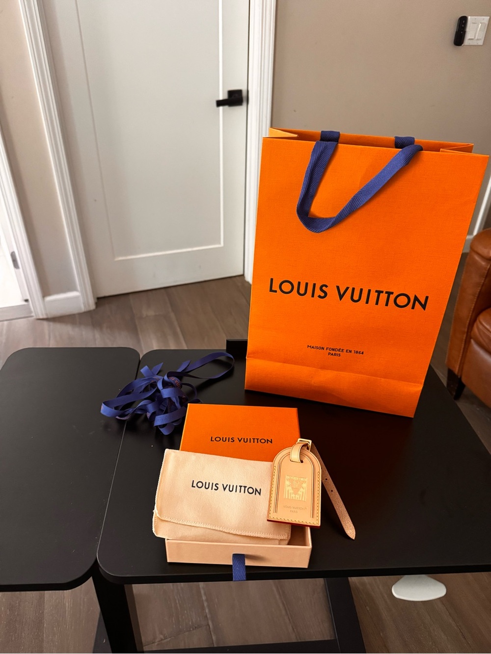 Louis Vuitton with Beige Pouch and Tan Leather Luggage Tag gold Beverly Hills